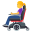 woman in motorized wheelchair