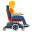 person in motorized wheelchair facing right