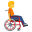 person in manual wheelchair facing right